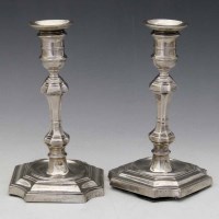 Lot 160 - Pair of filled silver George I style candlesticks