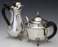 Lot 169 - Silver tea pot and hot water jug.