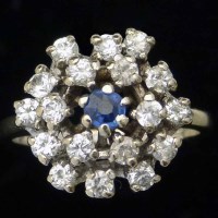 Lot 216 - 18ct white gold sapphire and diamond cluster ring