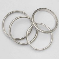 Lot 230 - Four platinum wedding rings