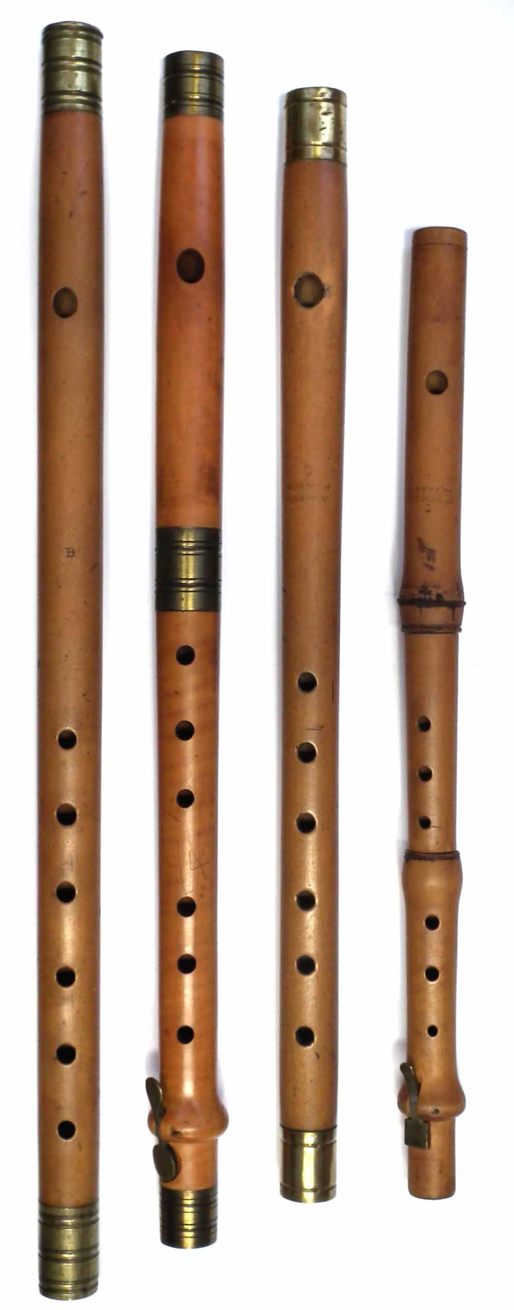 Lot 27 Three box wood fifes also a piccolo.