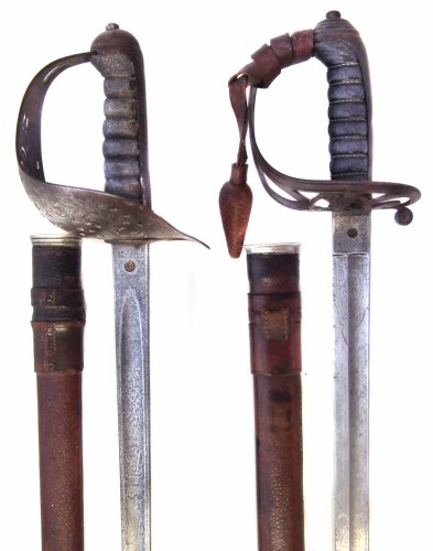 Lot 33 - Two rifle officers swords.
