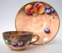 Lot 78 - Royal Worcester Fallen Fruit cup and saucer.