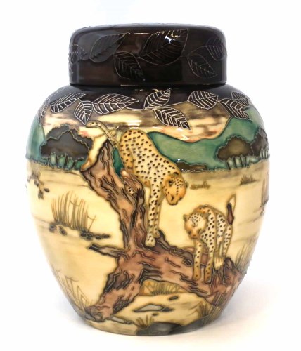 Lot 103 - Moorcroft ginger jar and cover, decorated with