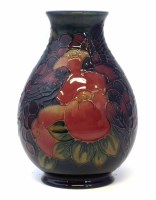 Lot 105 - Moorcroft vase, decorated with Finches and Fruit