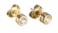 Lot 238 - Pair of diamond solitaire 18ct yellow gold stud earrings