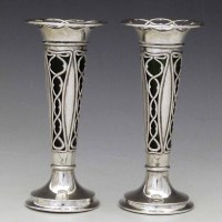 Lot 161 - A pair of silver bud vases with green glass liner, Birmingham 1909.