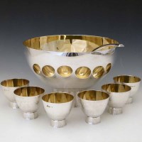 Lot 165 - Punch bowl, six cups and a ladle.