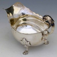 Lot 178 - Silver sauce boat.