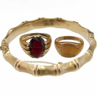 Lot 186 - 9ct bamboo bangle and two signet rings.