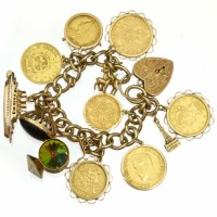 Lot 203 - 9ct gold bracelet set with seven gold coins and
