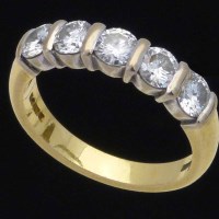 Lot 224 - Five stone diamond engagement ring.