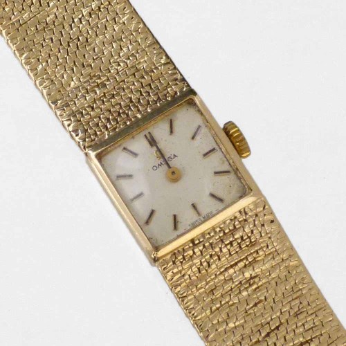 Lot 253 - Omega 9ct gold lady's bracelet watch, 33.1g.