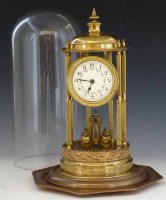 Lot 448 - Year movement clock under glass dome.