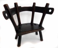 Lot 493 - Late 18th century Welsh oak and ash primitive five legged yolk back child's arm chair.