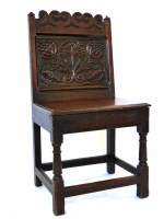 Lot 517 - 17th century oak back stool