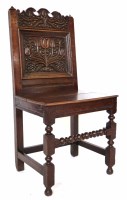 Lot 518 - 17th century oak back stool