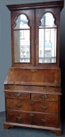 Lot 529 - 18th century Queen Anne walnut bureau bookcase.