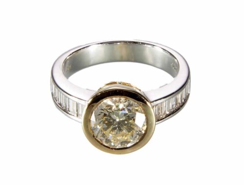 Lot 259 - 2.17 carat diamond solitaire ring with diamond set shoulders