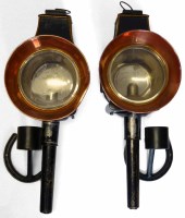 Lot 25 - Pair of coach lamps with horse shoe wall