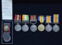 Lot 53 - National Fire Brigades Union Long Service medals and another family group of medals.
