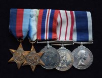 Lot 55 - A World War II Royal Navy group of five medals awarded to MX.122739 D.F.W. WELCH. S.P.O. H.M.S. BELLEROPHON.