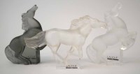 Lot 92 - Three Lalique horses.