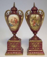 Lot 136 - Pair of Vienna style vases, painted with titled