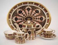 Lot 161 - Royal Crown Derby miniature teaset, to include