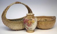 Lot 180 - Two Royal Worcester baskets and a vase