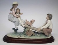 Lot 201 - Lladro see-saw group