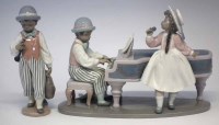 Lot 202 - Lladro piano group and clarinet player