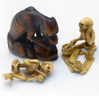 Lot 224 - Japanese boxwood carving of a scavenging dog with