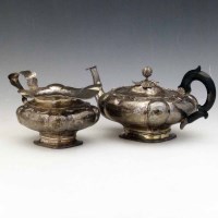 Lot 240 - Silver teapot and cream jug, Dutch 19th century.