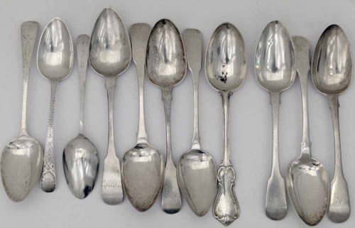 Lot 244 - Four Channel Islands silver table spoons, three