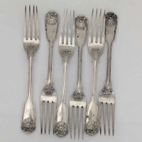 Lot 246 - Set of six silver fiddle and shell table forks.