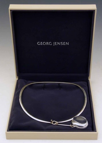 Lot 283 - George Jensen sterling silver neck ring with rock