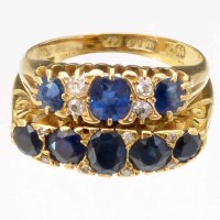 Lot 300 - Two 18ct gold sapphire and diamond rings
