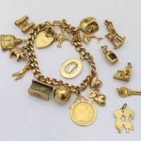 Lot 307 - 9ct gold charm bracelet