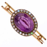 Lot 313 - Amethyst and moonstone oval setting on yellow metal