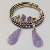 Lot 318 - A pair of lavender coloured jade earrings, also a