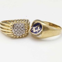 Lot 335 - Nine stone diamond ring and a Masonic ring (2).