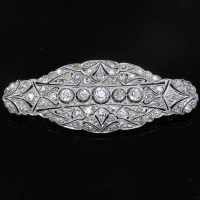 Lot 340 - White gold and diamond brooch.