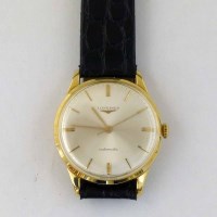 Lot 365 - Longines automatic 18ct gold man's watch on