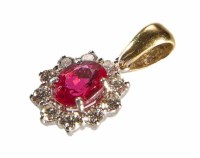 Lot 258 - Ruby and diamond 18ct gold cluster pendant