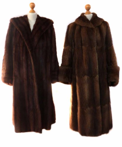 Lot 405 - Two calf length brown fur coats