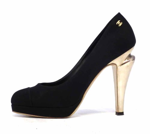 Lot 428 - Chanel black suede shoes with gold heels.