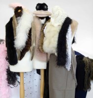 Lot 473 - Two boxes of real and fake fur wraps, cuffs