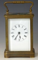 Lot 668 - Brass carriage clock with two keys.