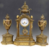 Lot 672 - Three piece clock garniture